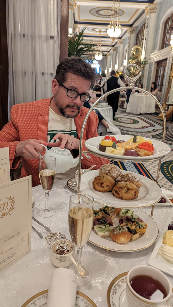 This is Dan Morfitt enjoying an Afternoon Tea of Earl Grey with milk, cakes and little sandwiches. It was in Washington DC. The venue was full of Baby Showers. You could taste the brooding in the air.
